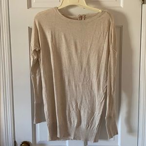 Lightweight cream-colored long sleeve sweater